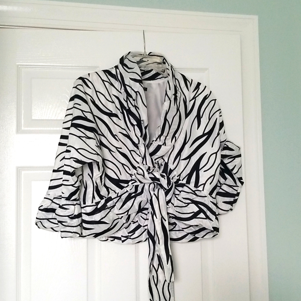 Black and white jacket with front tie closure